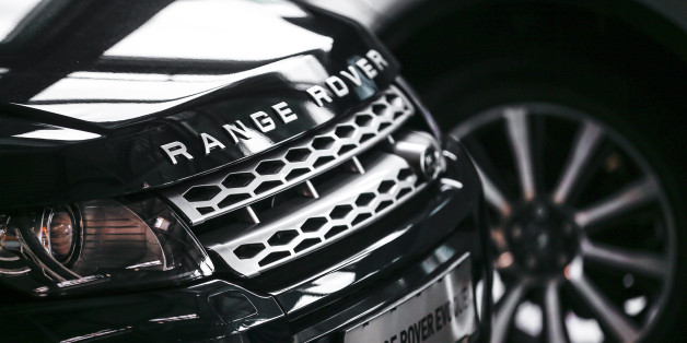 Range Rover Evoque cars are on display at a car dealer in Berlin, August 23, 2014. The German premiums have long been on a roll, producing an export-driven sales explosion and huge returns while mass carmakers struggled through Europe's crisis. But in a headlong sales race, second-placed Audi and runner-up Mercedes have both vowed to depose BMW, giving rise to heavy discounting, which sullies luxury brands and creates opportunities for the growing competition, observers say. Now a host of younge
