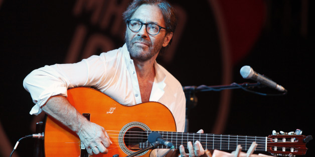 U.S. guitarist Al Di Meola performs with his World Sinfonia band during the 22nd Malta Jazz Festival in Valletta, July 19, 2012. REUTERS/Darrin Zammit Lupi (MALTA - Tags: ENTERTAINMENT SOCIETY) MALTA OUT. NO COMMERCIAL OR EDITORIAL SALES IN MALTA