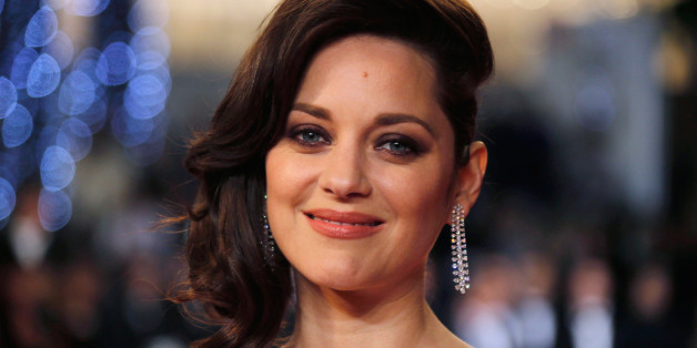 FILE PHOTO -- Cast member Marion Cotillard poses on the red carpet as they arrive for the screening of the film "Juste la fin du monde" (It s Only the End of the World) in competition at the 69th Cannes Film Festival in Cannes, France, May 19, 2016. REUTERS/Regis Duvignau/File Photo