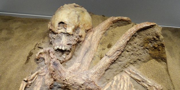 Burial of a youth with the antlers of a red deer from the Qafzeh Cave. Dated from the Mousterian culture. (Photo by Universal History Archive/UIG via Getty Images)