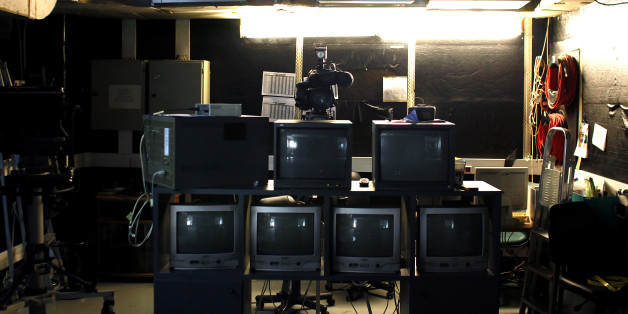 TO GO WITH AFP STORY BY HELENE COLLIOPOULOUA photo taken on January 26, 2012 shows television monitors in a studio at Alter TV in Athens. Greece's once-proliferating media sector has been hobbled by the ongoing financial crisis. Where once new publications would often debut, today the industry is grappling with layoffs, dwindling circulation and viewership, and sharp pay cuts. In a country of just 11 million people, Greeks until recently enjoyed a plethora of outlets, with about 10 news channel