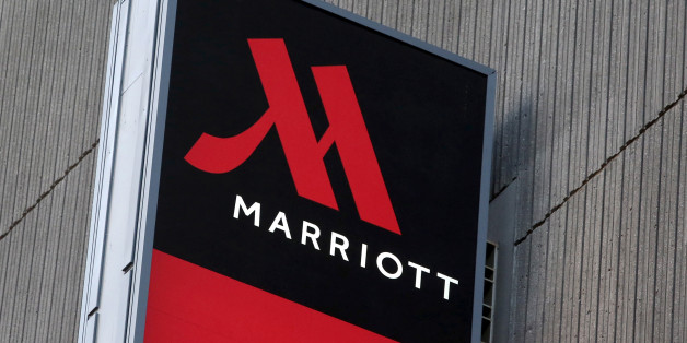 Signage for the New York Marriott Marquis is seen in Manhattan, New York, November 16, 2015. REUTERS/Andrew Kelly/File Photo
