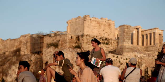 Tourists at the Athens Acropolis on 26 July 2016.
Andreadis president of SETE (Association of Greek Tourism Enterprises) Greece might win 'last minute' tourists planning to go to Turkey, but ultimately because of the situation after the coup choose Greece, however, the overall tourism development remains fragile. Earlier this year, SETE had predicted a 5% increase in tourism revenue for 2016 to 15 billion Euros and 25 million tourists (23.6 mil. Last year). (Photo by Panayiotis Tzamaros/NurPhoto via Getty Images)