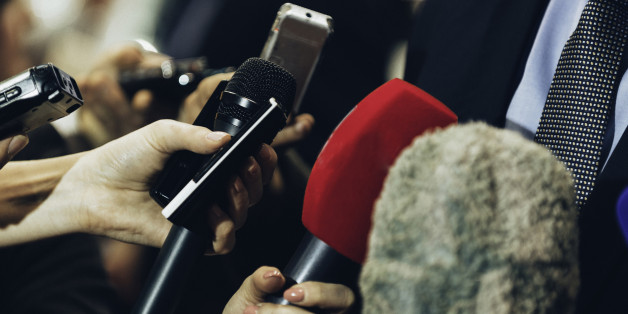 Interviewing business man on press conference