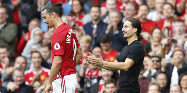 Britain Football Soccer - Manchester United v Leicester City - Premier League - Old Trafford - 24/9/16Manchester United's Zlatan Ibrahimovic as a fan invades the pitchAction Images via Reuters / Carl RecineLivepicEDITORIAL USE ONLY. No use with unauthorized audio, video, data, fixture lists, club/league logos or "live" services. Online in-match use limited to 45 images, no video emulation. No use in betting, games or single club/league/player publications. Please contact your account representat
