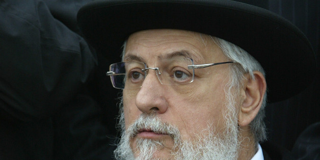 Chief Rabbi of France Joseph Sitruk attends a ceremony near the Jewish cemetery of Herrlisheim, Eastern France, May 6, 2004. 127 graves, desecrated by vandals with Nazi swastikas and anti-semitic slogans written in German, were found last April 30 in this graveyard. REUTERS/Vincent Kessler VK/ANB/CRB