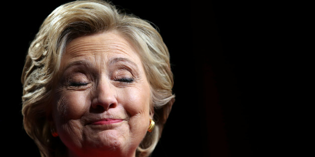 U.S. Democratic presidential candidate Hillary Clinton pauses as she speaks with campaign supporters after the first presidential debate with Republican presidential nominee Donald Trump, in Westbury, New York, U.S., September 26, 2016. REUTERS/Carlos Barria