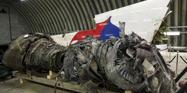Wreckage of the MH17 airplane is seen after the presentation of the final report into the crash of July 2014 of Malaysia Airlines flight MH17 over Ukraine in Gilze Rijen, the Netherlands, October 13, 2015. Malaysian Airlines Flight 17 was shot down over eastern Ukraine by a Russian-made Buk missile, the Dutch Safety Board said on Tuesday in its final report on the July 2014 crash that killed all 298 aboard. The long-awaited findings of the board, which was not empowered to address questions of r