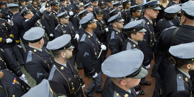 Prince Georgeâs County, Md. police officer leave the church after funeral services for Police Officer First Class Jacai Colson at First Baptist Church of Glenarden, Friday, March 25, 2016, in Upper Marlboro, Md. Jacai Colson, a four-year veteran of the force and a undercover narcotics officer was mortally wounded by his own colleagues as he responded to an attack on his police station by a gunman with a death wish. ( AP Photo/Jose Luis Magana)