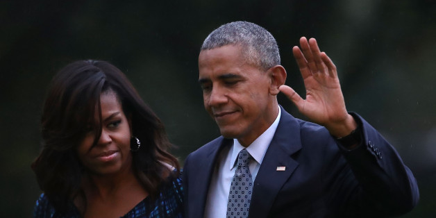 WASHINGTON, DC - SEPTEMBER 28: U.S. President Barack Obama and First Lady Michelle Obama arrive back at the White House after attending a town hall meeting at Fort Lee, Virginia, September 28, 2016 in Washington, DC. Earlier today Congress voted to override President Obama's veto of legislation allowing families of terrorist victims to sue governments suspected of sponsoring terrorism.
(Photo by Mark Wilson/Getty Images)