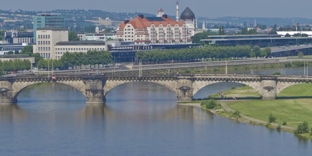 DRESDEN, SAXONIA, GERMANY - 2012/07/06: The 'Maritim Hotel' and the 'Kongresszentrum' behind the bridge 'Marienbrücke' crossing the river 'Elbe'.. (Photo by Frank Bienewald/LightRocket via Getty Images)