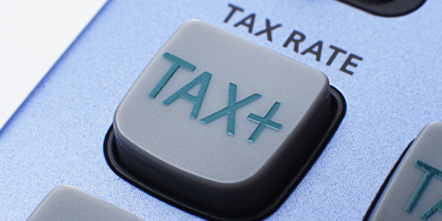 Close-up of tax rate button on calculator