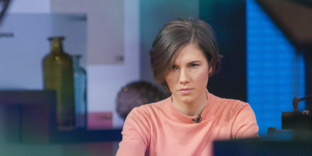 Amanda Knox sits alone before being interviewed on the set of ABC's "Good Morning America" in New York January 31, 2014. Knox vowed on Friday to fight her second conviction for the murder of British student Meredith Kercher in 2007 while the two were students together in the Italian university town of Perugia. REUTERS/Andrew Kelly (UNITED STATES - Tags: CRIME LAW)