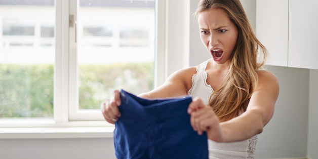 Cropped shot of a young woman reacting angrily to the fact her shorts shrunk in the dryerhttp://195.154.178.81/DATA/i_collage/pi/shoots/805659.jpg