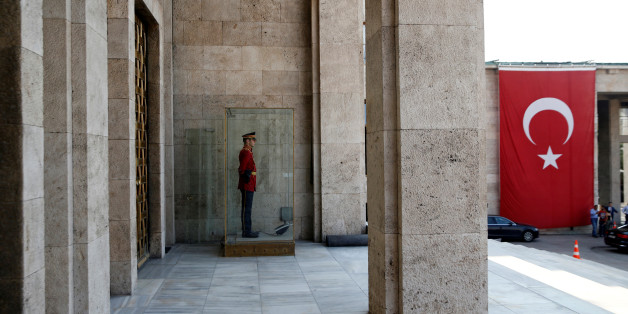 A guard stands at his post in front of the Turkish parliament in Ankara,Turkey, July 19, 2016. REUTERS/Baz Ratner