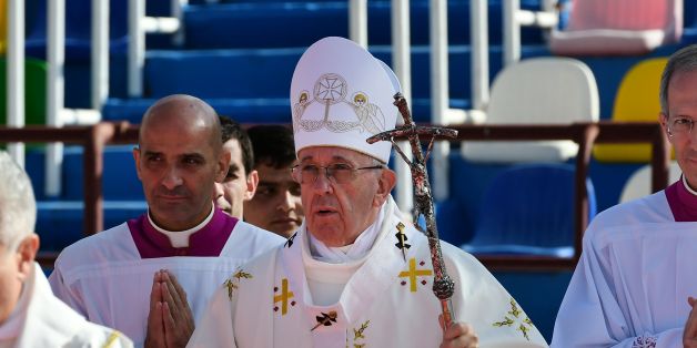 Pope Francis (C) arrives for a Holy Mass at the stadium in Tbilisi on October 1, 2016.Pope Francis landed in Georgia on September 30 for a visit billed as a mission of peace to the volatile Caucasus region that will also take him to Azerbaijan just months after he visited neighbouring Armenia. / AFP / VINCENZO PINTO (Photo credit should read VINCENZO PINTO/AFP/Getty Images)