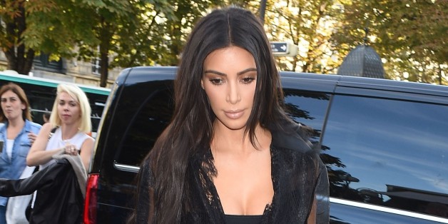 Photo by: KGC-195/STAR MAX/IPx 2016 9/28/16 Celebrity prankster Vitalii Sediuk strikes again - this time, grabbing Kim Kardashian outside L'Avenue Restaurant during Paris Fashion Week. Sediuk has physically accosted a number of celebrities - gaining access to otherwise restricted areas with the use of press credentials from his former employer, Ukrainian Television TV Channel 1+1. (Paris, France)