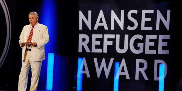 GENEVA, SWITZERLAND - OCTOBER 03: In this handout image provided by the UNHCR, Martin Bell gives speech during the 2011 Nansen Refugee Award ceremony on October 3, 2011 in Geneva, Switzerland. The prize was awarded to the founder and 290 staff of SHS, a non-governmental organization, for their life-saving work in helping the thousands of refugees and migrants who arrive on Yemen's shores each year. (Photo by J Tanner/UNHCR via Getty Images)