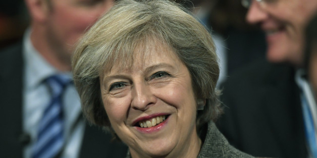 Britain's Prime Minister Theresa May listens to speeches at the Conservative Party conference in Birmingham, Britain October 3, 2016. REUTERS/Toby Melville