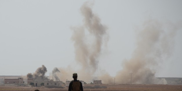 ALEPPO, SYRIA - OCTOBER 4: Smoke rises after Free Syrian Army (FSA) members attack Daesh terrorist in Turkmen Barih village near Cobanbey town during the 'Operation Euphrates Shield' in Aleppo, Syria on October 4, 2016. The anti-Daesh operation called Euphrates Shield, which was launched on August 24, aims at improving security, supporting coalition forces, supporting Syrias territorial integrity and eliminating the terror threat along Turkeys border through Free Syrian Army (FSA) fighters backe