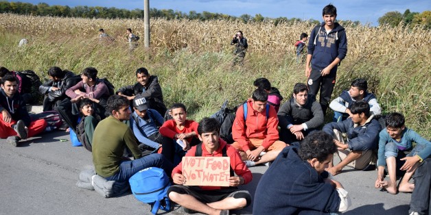 BELGRADE, SERBIA - OCTOBER 4: Refugees make their way to Hungarian border with Serbia near the town of Horgos in Belgrade, Serbia on October 4, 2016. More than 200 refugees start to move towards to Hungary after Hungarians voted to reject refugee quotas.
(Photo by Kristina Maslarevic/Anadolu Agency/Getty Images)