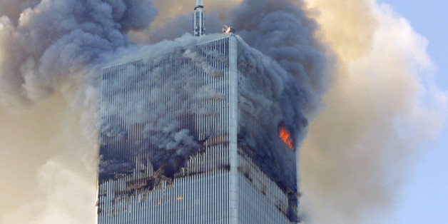 FILE- In this Tuesday, Sept. 11, 2001 file photo, fire and smoke billows from the north tower of New York's World Trade Center after terrorists crashed two hijacked airliners into the World Trade Center and brought down the twin 110-story towers. A bill passed by Congress allowing the families of 9/11 victims to sue the Saudi government has reinforced to some in the Arab world a long-held view that the U.S. only demands justice for its own victims of terrorism, despite decades of controversial U.S. interventions around the world. (AP Photo/David Karp, File)