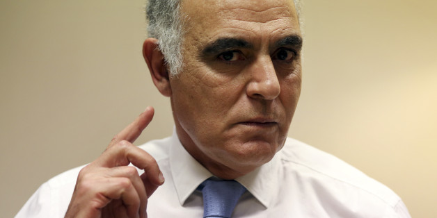 Morocco's Foreign Minister Salaheddine Mezouar gestures during an interview with Reuters in Madrid February 4, 2014. Morocco has recruited foreign investors to fund a $9 billion solar power project, even though some European lenders have balked due to the location of some planned plants in the disputed Western Sahara, Mezouar said. REUTERS/Susana Vera (SPAIN - Tags: POLITICS BUSINESS ENVIRONMENT)