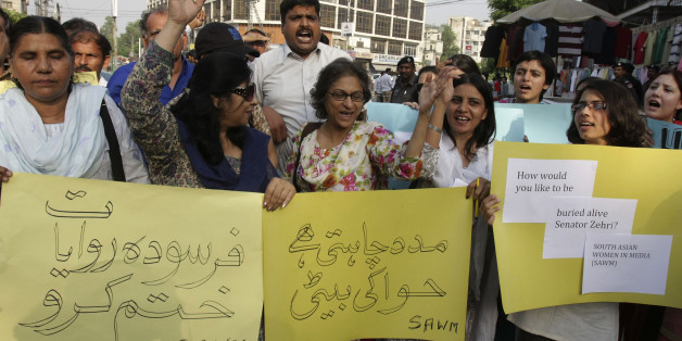 Pakistani human rights activist demonstrate against the honor killing, Monday, Sept. 1, 2008 in Lahore, Pakistan. Police say they have opened an investigation into the "honor killings" of five women who were allegedly shot and then buried alive one month ago in Baluchistan province after several insisted on marrying men of their own choosing. The brutality of the crime and foot-dragging by police sparked outrage in Pakistan, especially after a lawmaker defended the killings in Parliament last we