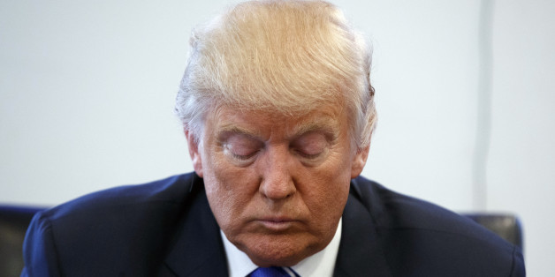 Republican presidential candidate Donald Trump pauses during a meeting with members of the National Border Patrol Council at Trump Tower, Friday, Oct. 7, 2016, in New York. (AP Photo/ Evan Vucci)