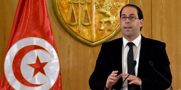 Tunisia's premier-designate Youssef Chahed speaks during a press conference to present his proposed new unity government list after he submitted it to the president on August 20, 2016 in Carthage, near the capital Tunis. Chahed, a 40-year-old former local affairs minister and member of the Nidaa Tounes party, had been given 30 days to form a cabinet. If his cabinet wins the backing of parliament, Chahed will become the North African country's youngest premier since independence from France in 19
