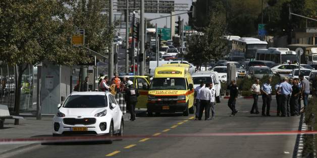 Israeli security forces cordon off the site of a shooting attack near Israeli police headquarters, close to the line dividing mainly Palestinian east Jerusalem from the mostly Jewish western sector of the city, on October 9, 2016.
A shooting attack in Jerusalem left at least three people wounded, including two seriously, with the assailant killed by police, Israeli authorities said.
/ AFP / AHMAD GHARABLI (Photo credit should read AHMAD GHARABLI/AFP/Getty Images)