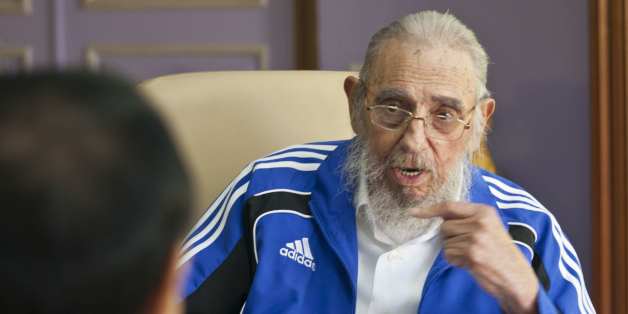 Cuba's former leader Fidel Castro talks with China's Premier Li Keqiang in Havana, Cuba, Sunday, Sept. 25, 2016. Li Keqiang is on a two-day official visit to Cuba. (AP Photo/Alex Castro)
