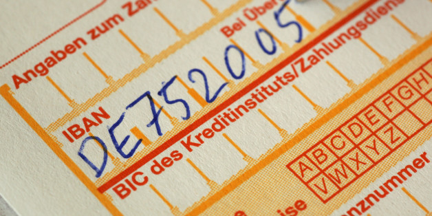 Ein Überweisungsträger - das ausgediente Modell ist die langsamste Methode, Geld zu überweisen