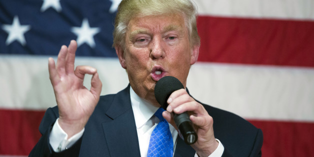 In this Oct. 6, 2016, photo, Republican presidential candidate Donald Trump speaks during a town hall in Sandown, N.H. Trump made a series of lewd and sexually charged comments about women as he waited to make a cameo appearance on a soap opera in 2005. The Republican presidential nominee issued a rare apology Friday, âif anyone was offended.â (AP Photo/ Evan Vucci)