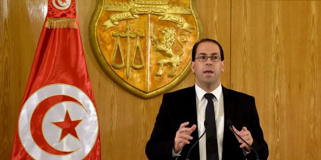 Tunisia's premier-designate Youssef Chahed speaks during a press conference to present his proposed new unity government list after he submitted it to the president on August 20, 2016 in Carthage, near the capital Tunis. Chahed, a 40-year-old former local affairs minister and member of the Nidaa Tounes party, had been given 30 days to form a cabinet. If his cabinet wins the backing of parliament, Chahed will become the North African country's youngest premier since independence from France in 19