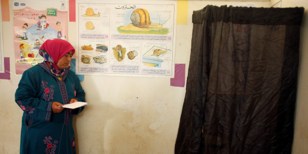 A voter waits to cast her ballot at a polling station on the outskirts of Rabat, Morocco October 7, 2016. REUTERS/Youssef Boudlal