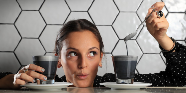 OCTOBER 7, 2016: MELBOURNE, VIC. (EUROPE AND AUSTRALASIA OUT) Katherine Rizos of the 'White Mojo' cafe makes a black latte in Melbourne, Victoria. The latte is made with sesame seeds, peanuts and almonds blended with soy milk. (Photo by Alex Coppel/Newspix/Getty Images)