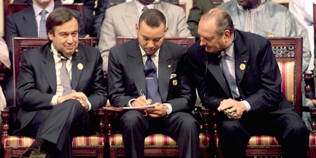 French President Jacques Chirac (R) looks over the shoulder of King Mohammed VI of Morocco as they sit alongside Portugese Prime Minister Antonio Guterres during the opening of the first Africa - Europe summit in Cairo April 3. Egyptian President Hosni Mubarak opened the first Africa-Europe summit on Monday with a call for a radical solution to Africa's debt crisis, as African and European leaders set out conflicting agendas for the dialogue.JDP/AA