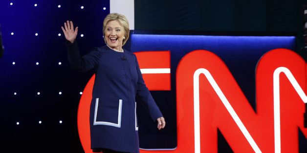 Democratic U.S. presidential candidate Hillary Clinton waves before the start of the Democratic U.S. presidential candidates' debate in Flint, Michigan, March 6, 2016. REUTERS/Carlos Barria