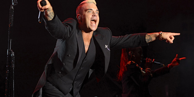 Sänger Robbie Williams bewegt sich viel auf der Bühne - doch jetzt macht ihm sein Rücken zu schaffen