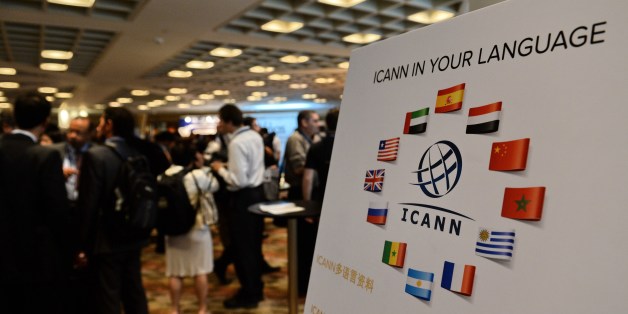 Participants take a break after the Internet Corporation for Assigned Names and Domain (ICANN) opening in Singapore meeting on March 24, 2014. ICANN on on March 24 kicked off a four-day meeting on the future of the web, after the US said it would hand over control of technical operations to international stakeholders. AFP PHOTO / ROSLAN RAHMAN (Photo credit should read ROSLAN RAHMAN/AFP/Getty Images)