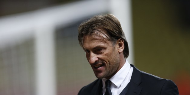 Sochaux coach Hervé Renard (L) reacts following the French L1 football match Monaco (ASM) vs Sochaux (FCSM) on March 8, 2014 at the Louis II Stadium in Monaco. AFP PHOTO / VALERY HACHE (Photo credit should read VALERY HACHE/AFP/Getty Images)