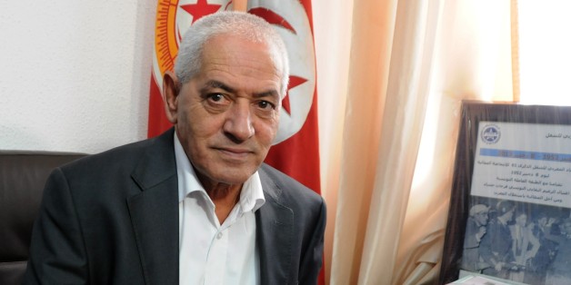 Houcine Abassi, secretary general of the Tunisian General Labour Union (UGTT), poses for a photograph in his office at the headquarters in Tunis, Tunisia, Friday, Oct. 9, 2015. Abassi is one of the four members of the Tunisian National Dialogue Quartet to be awarded the 2015 Nobel Peace Prize on Friday by the Norwegian Nobel Committee. (AP Photo)