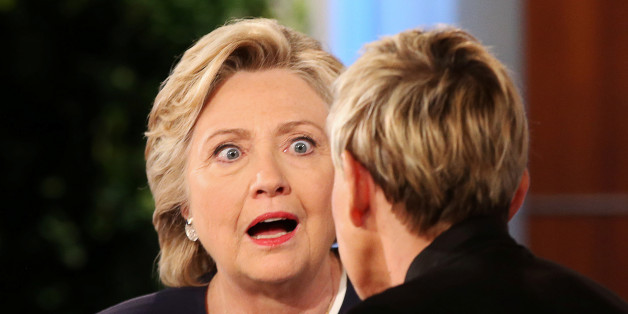 U.S. Democratic presidential nominee Hillary Clinton (L) chats to Ellen DeGeneres during a commercial break in taping of the Ellen Show in Burbank, Los Angeles, California, U.S. October 13, 2016. REUTERS/Lucy Nicholson