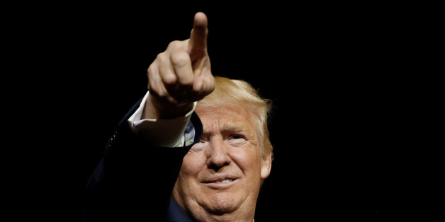 Republican U.S. presidential nominee Donald Trump gestures to the audience at a campaign rally in West Palm Beach, Florida, U.S., October 13, 2016. REUTERS/Mike Segar