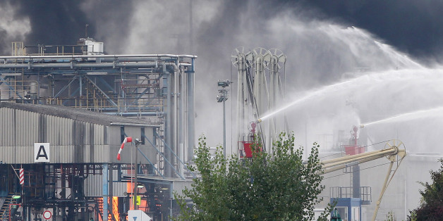 Firemen try to extinguish the fire in the Chemical plant of the BASF site in Ludwigshafen, western Germany on October 17, 2016.Several people were missing and others were injured after an explosion at a chemical plant at BASF's headquarters in western Germany, the firm said, advising local people to stay indoors. / AFP / DANIEL ROLAND (Photo credit should read DANIEL ROLAND/AFP/Getty Images)