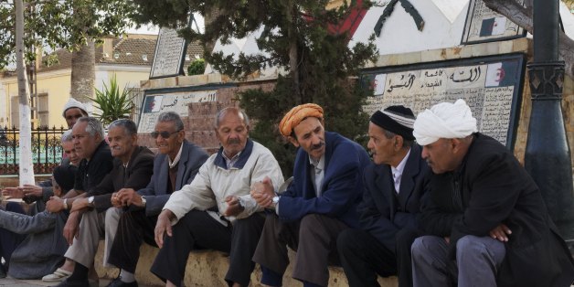 EL MALAH, ALGERIA - APRIL 14: Elderly men gather in the town hall square on April 14, 2011, in El Malah, Algeria, at a monument dedicated to the martyrs who died during the Algerian war (1954-1962). (Photo by Reza/Getty Images)