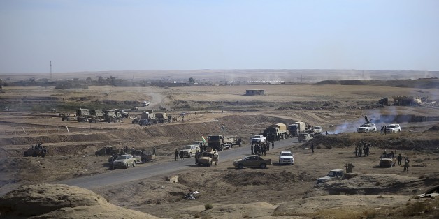 NINEVEH, IRAQ - OCTOBER 18: Peshmerga forces belonging to the Iraqi Kurdish Regional Government (IKRG) located at Hazir front in the Hasan Sam village are on their way to Besika with their armoured vehicles during an operation to retake Iraq's Mosul from Deash in Nineveh, Iraq on October 18, 2016. A much anticipated Mosul offensive to liberate the city from Deash began midnight Sunday, according to Iraqi Prime Minister. (Photo by Emrah Yorulmaz/Anadolu Agency/Getty Images)