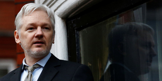 WikiLeaks founder Julian Assange makes a speech from the balcony of the Ecuadorian Embassy, in central London, Britain February 5, 2016. REUTERS/Peter Nicholls/File Photo