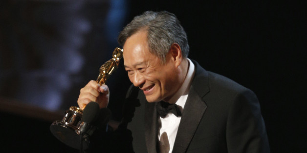Director Ang Lee reacts after winning the Oscar for best director for "Life of Pi" at the 85th Academy Awards in Hollywood, California, February 24, 2013. REUTERS/Mario Anzuoni (UNITED STATES - Tags: ENTERTAINMENT) (OSCARS-SHOW)